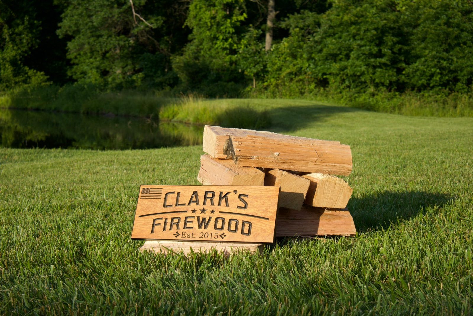 A delivery-ready stack of Clark's kiln-dried firewood