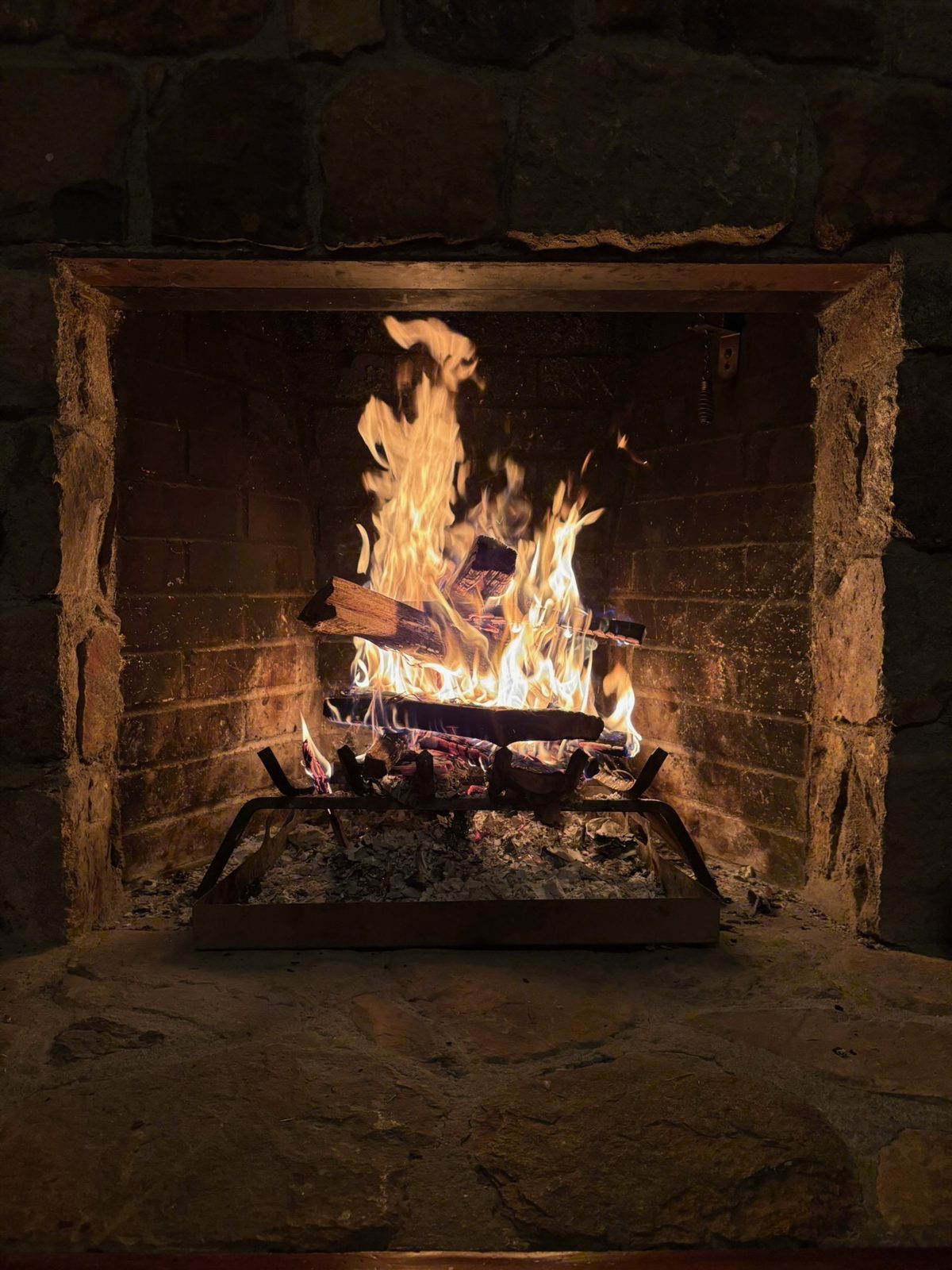 A well-lit fire built with kiln-dried firewood